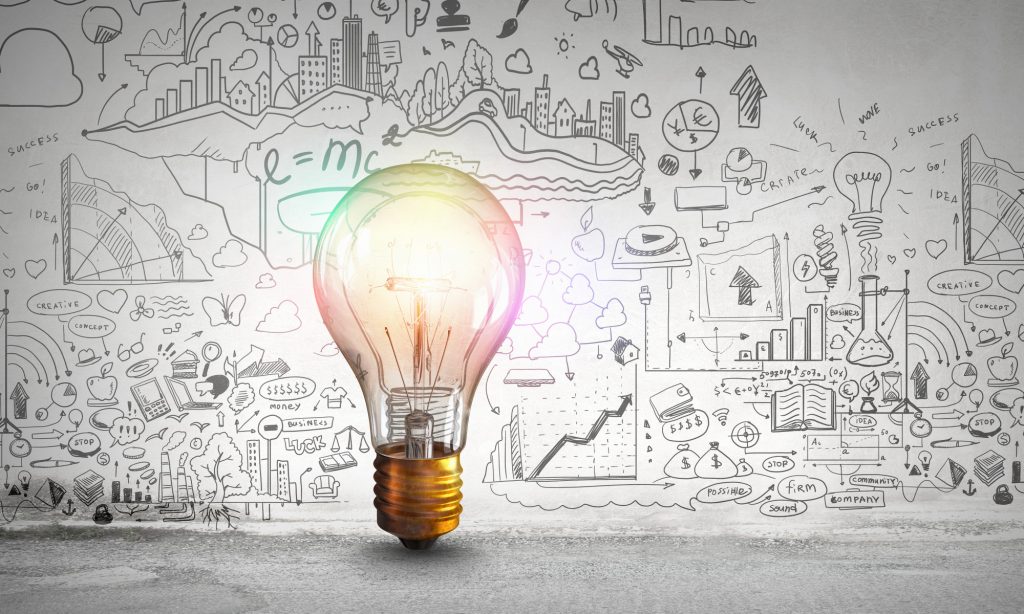 drawings of marketing ideas and lightbulb