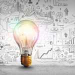 drawings of marketing ideas and lightbulb