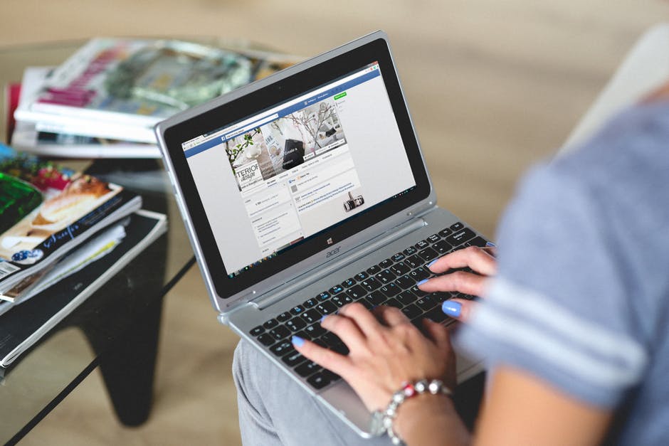 person typing on computer