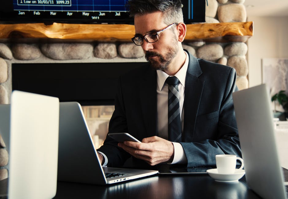 person with laptop at table