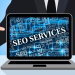 SEO services text on computer