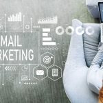 email marketing text and graphics and woman on laptop
